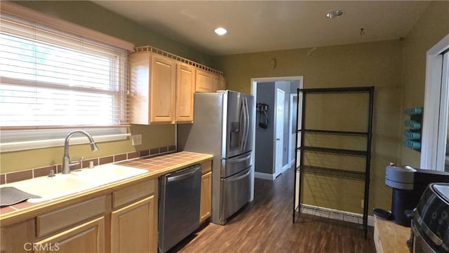 16701 Chatsworth St, Granada Hills, CA 91344 - kitchen with stainless steel appliances, a sink, tile countertops, dark wood-style floors, and recessed lighting