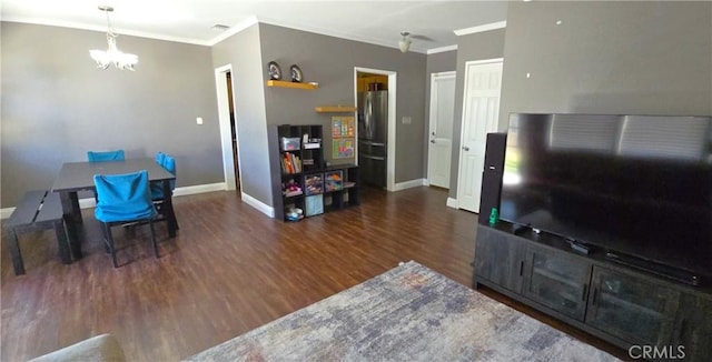 16701 Chatsworth St, Granada Hills, CA 91344 - living area featuring wood finished floors, a chandelier, baseboards, and crown molding