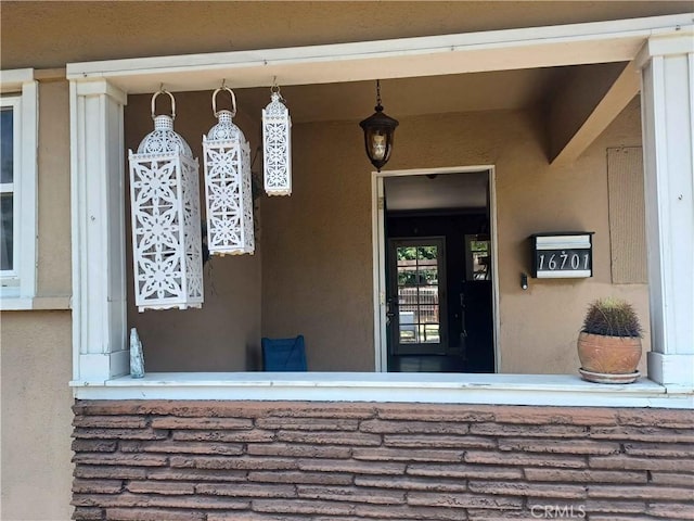 16701 Chatsworth St, Granada Hills, CA 91344 - entrance to property featuring stucco siding