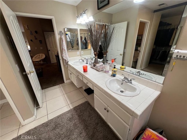 12413 Redrock Rd, Victorville, CA 92392 - full bath with double vanity, tile patterned flooring, and toilet