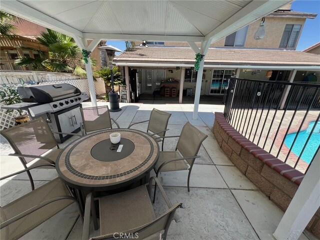 12413 Redrock Rd, Victorville, CA 92392 - view of patio / terrace with outdoor dining area and a grill