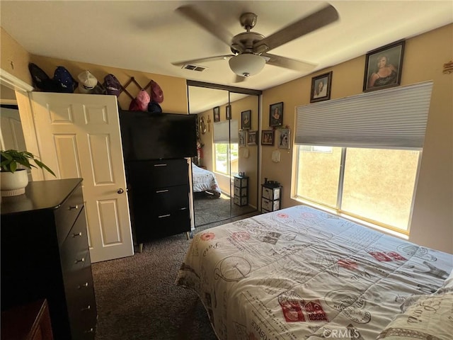 12413 Redrock Rd, Victorville, CA 92392 - bedroom featuring carpet floors, a closet, and a ceiling fan