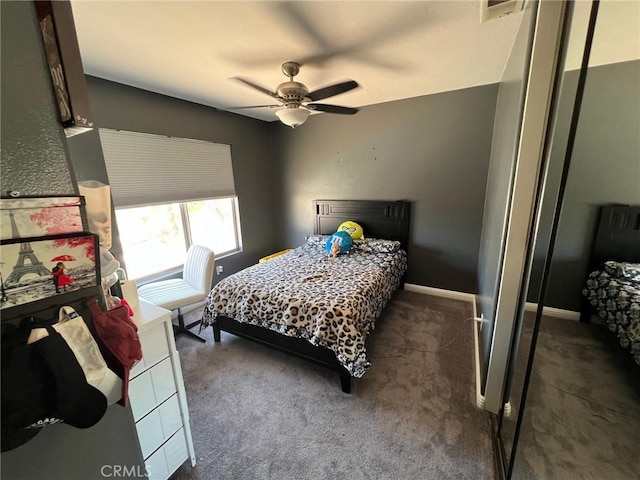12413 Redrock Rd, Victorville, CA 92392 - bedroom with a ceiling fan and dark carpet