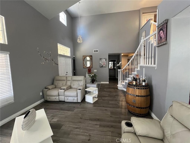 12413 Redrock Rd, Victorville, CA 92392 - living area featuring baseboards, high vaulted ceiling, stairway, and wood finished floors