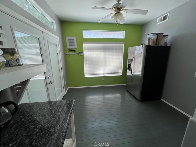 12413 Redrock Rd, Victorville, CA 92392 - dining space featuring ceiling fan, baseboards, and dark wood-style flooring