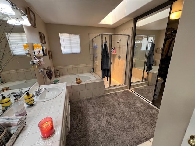 12413 Redrock Rd, Victorville, CA 92392 - bathroom with a bath, vanity, and a stall shower