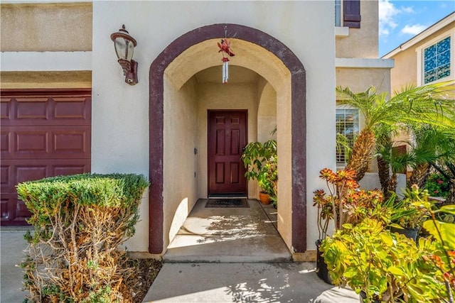 37814 Veranda Way, Murrieta, CA 92563 - property entrance with stucco siding and a garage