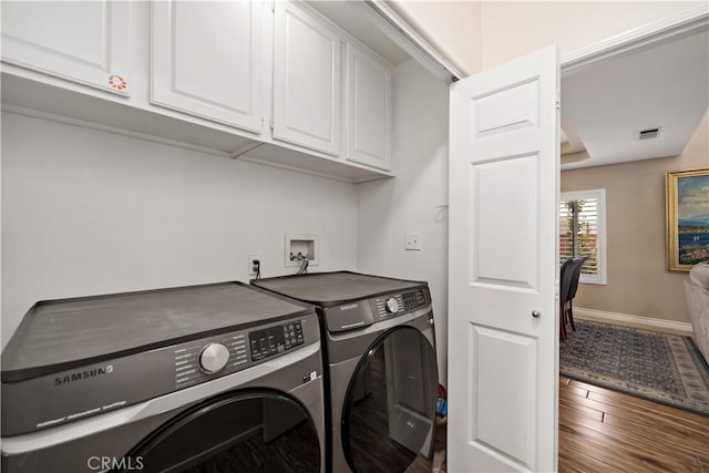 37814 Veranda Way, Murrieta, CA 92563 - laundry room with cabinet space, washer and clothes dryer, wood finished floors, and baseboards
