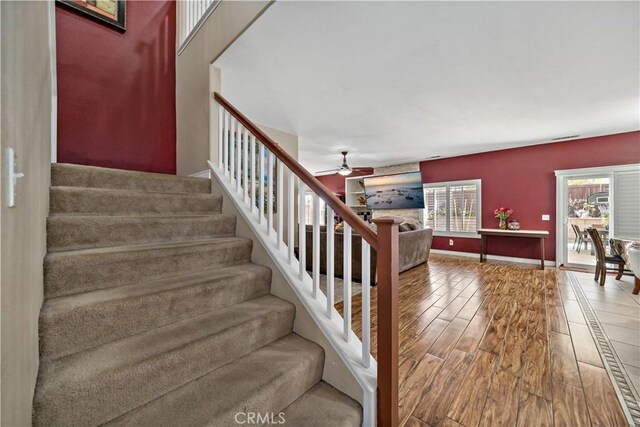 37814 Veranda Way, Murrieta, CA 92563 - stairs with wood finished floors, ceiling fan, and baseboards