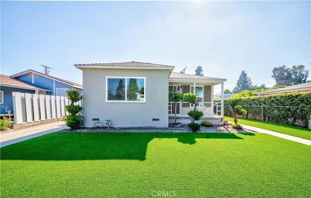 3433 Sherbourne Dr, Culver City, CA 90232 - rear view of property featuring stucco siding, crawl space, and a sunroom