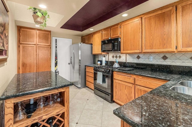 4243 Corte De La Siena, San Diego, CA 92130 - kitchen featuring black appliances, decorative backsplash, open shelves, light tile patterned flooring, and dark stone countertops