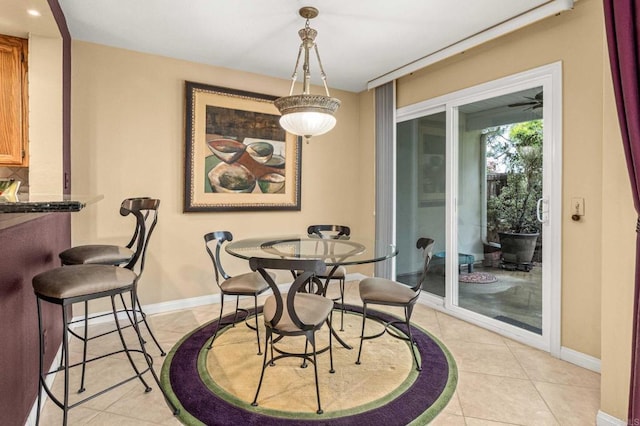 4243 Corte De La Siena, San Diego, CA 92130 - dining room with light tile patterned floors and baseboards