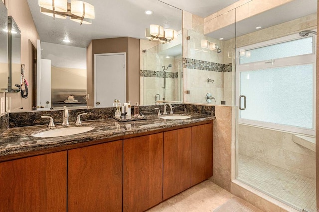 4243 Corte De La Siena, San Diego, CA 92130 - full bathroom featuring a shower stall, double vanity, and tile patterned floors