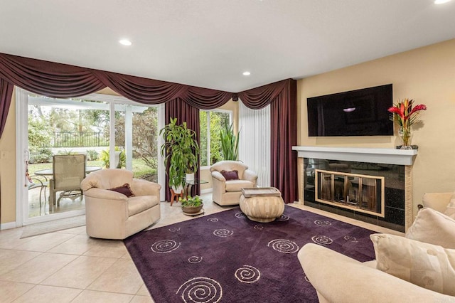 4243 Corte De La Siena, San Diego, CA 92130 - tiled living area with a tile fireplace and recessed lighting