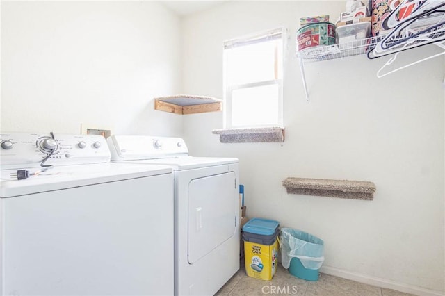 14752 Grafton Ln, Helendale, CA 92342 - laundry area with separate washer and dryer and baseboards