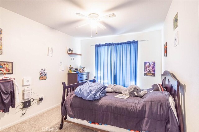 14752 Grafton Ln, Helendale, CA 92342 - bedroom featuring carpet, a ceiling fan, and baseboards