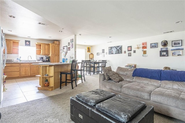 14752 Grafton Ln, Helendale, CA 92342 - living area featuring light colored carpet, light tile patterned floors, and recessed lighting