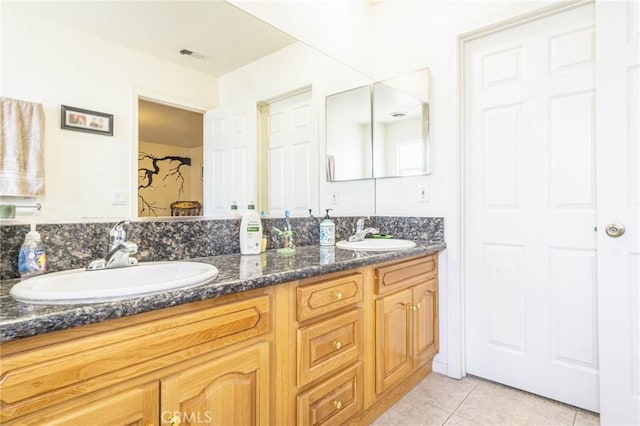 14752 Grafton Ln, Helendale, CA 92342 - bathroom featuring double vanity and tile patterned floors