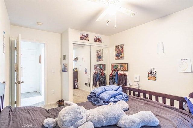 14752 Grafton Ln, Helendale, CA 92342 - bedroom featuring carpet, a closet, a ceiling fan, and baseboards