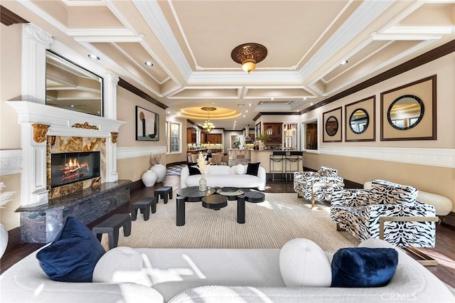 1539 Rodeo Rd, Arcadia, CA 91006 - living area featuring coffered ceiling, crown molding, wood finished floors, and a high end fireplace