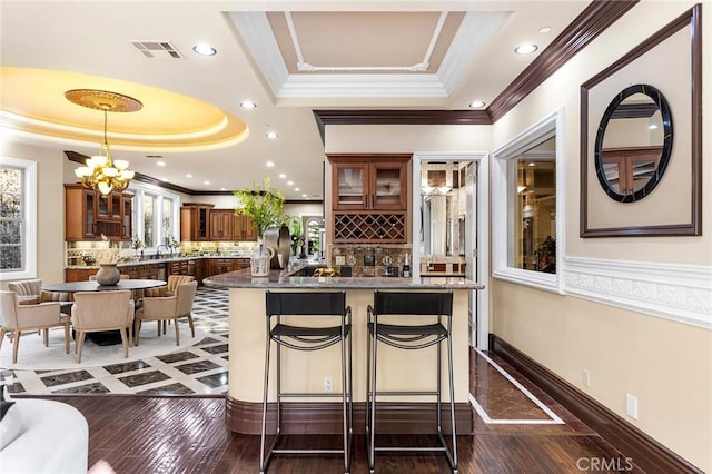 1539 Rodeo Rd, Arcadia, CA 91006 - bar area featuring a raised ceiling, crown molding, tasteful backsplash, pendant lighting, and recessed lighting