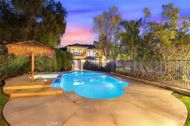 1539 Rodeo Rd, Arcadia, CA 91006 - pool at dusk with a fenced backyard, a patio, and a pool with connected hot tub