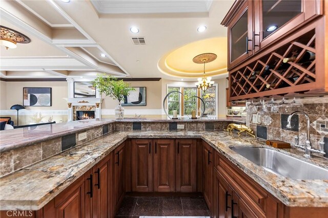 1539 Rodeo Rd, Arcadia, CA 91006 - indoor wet bar featuring a raised ceiling, a glass covered fireplace, granite tiled floors, crown molding, and recessed lighting