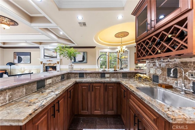 1539 Rodeo Rd, Arcadia, CA 91006 - indoor wet bar featuring a raised ceiling, a glass covered fireplace, granite tiled floors, ornamental molding, and recessed lighting
