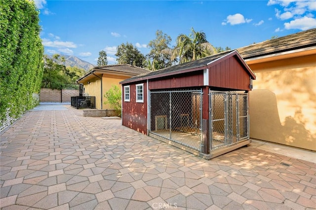 1539 Rodeo Rd, Arcadia, CA 91006 - view of patio with an exterior structure and an outdoor structure