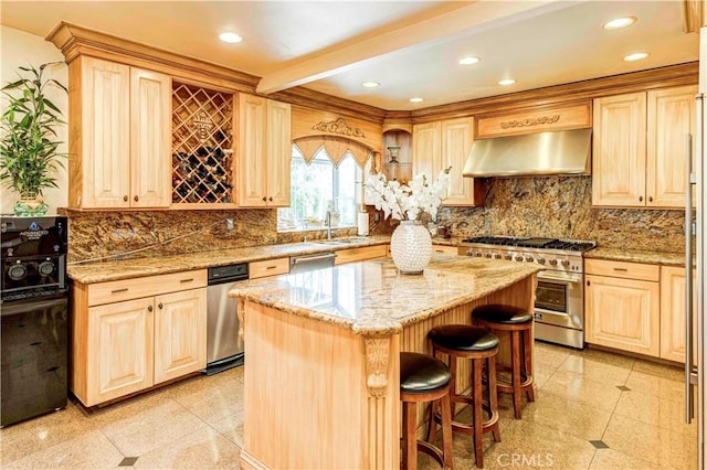 1610 N Hobart Blvd, Los Angeles, CA 90027 - kitchen featuring extractor fan, stainless steel appliances, a center island, light stone countertops, and a sink