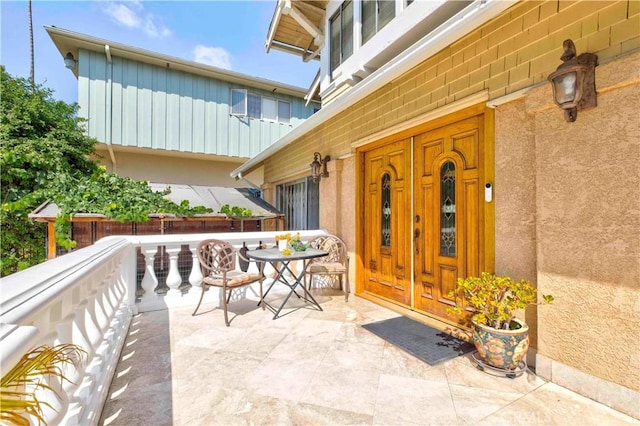 1610 N Hobart Blvd, Los Angeles, CA 90027 - property entrance with board and batten siding and stucco siding