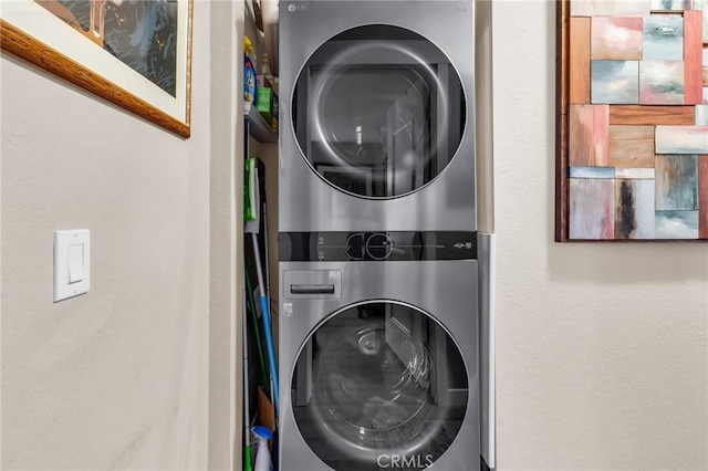 13219 Wimberly Sq Unit 306, San Diego, CA 92128 - laundry area with stacked washer / drying machine