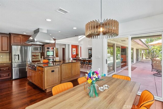 27121 Shenandoah Dr, Laguna Hills, CA 92653 - dining area featuring dark wood-style floors, recessed lighting, and a textured ceiling