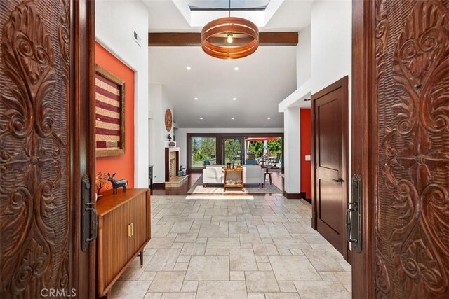 27121 Shenandoah Dr, Laguna Hills, CA 92653 - foyer entrance featuring stone tile floors, recessed lighting, and a high ceiling