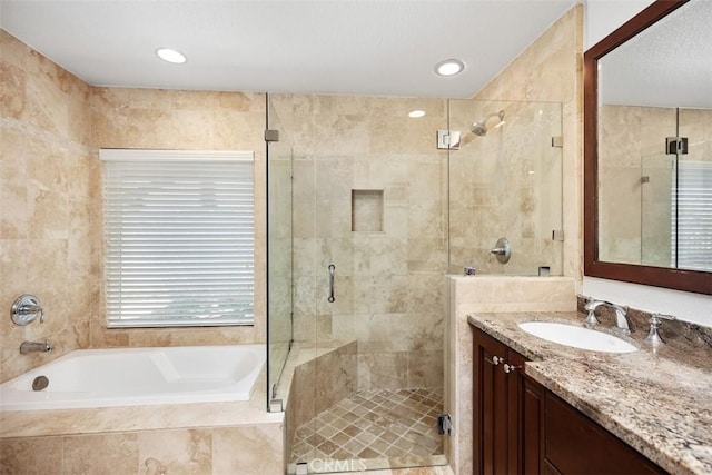 27121 Shenandoah Dr, Laguna Hills, CA 92653 - full bathroom with a garden tub, a shower stall, and vanity