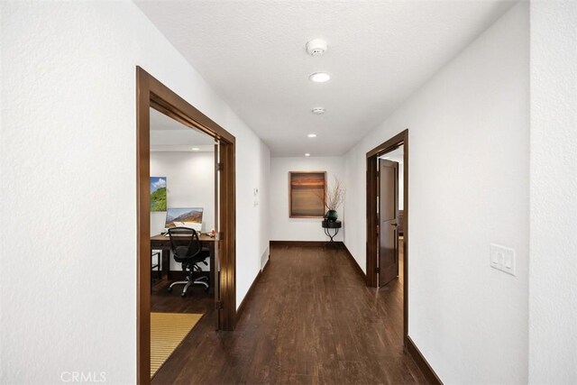 27121 Shenandoah Dr, Laguna Hills, CA 92653 - hallway with an office area, dark wood-style flooring, and recessed lighting