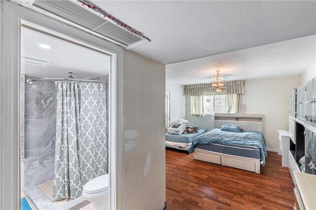 1849 Ayers Way, Burbank, CA 91501 - bedroom featuring wood finished floors and a textured ceiling