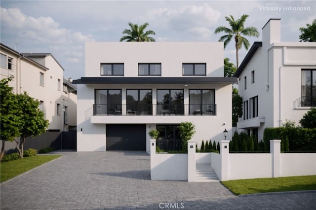 1849 Ayers Way, Burbank, CA 91501 - modern home featuring a fenced front yard, stucco siding, decorative driveway, and a garage