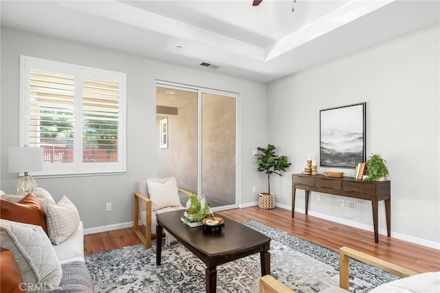 3274 Tinker Creek Way, Chico, CA 95973 - living room with wood finished floors, ceiling fan, baseboards, and a tray ceiling