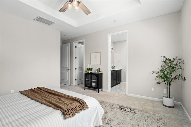 3274 Tinker Creek Way, Chico, CA 95973 - bedroom featuring light colored carpet, baseboards, a sink, and connected bathroom