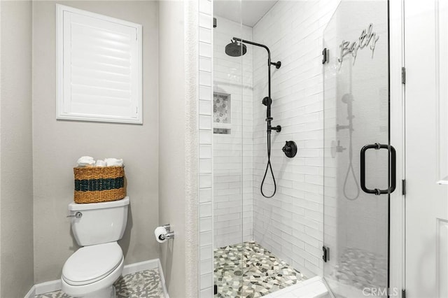 3274 Tinker Creek Way, Chico, CA 95973 - bathroom with a stall shower, toilet, and baseboards