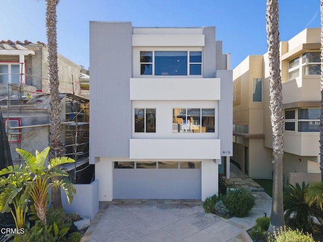 815 Mandalay Beach Rd, Oxnard, CA 93035 - view of front of house featuring stucco siding and a garage