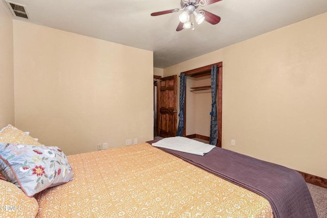 51793 Quail Ridge Rd, Oakhurst, CA 93644 - carpeted bedroom with a closet and a ceiling fan