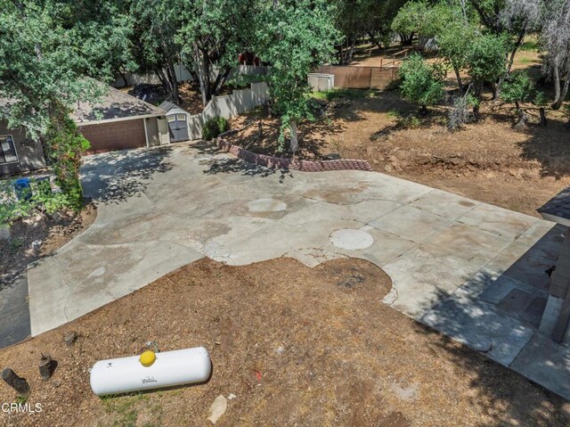 51793 Quail Ridge Rd, Oakhurst, CA 93644 - view of patio with an outbuilding