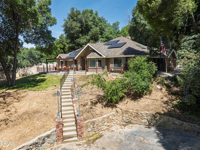 51793 Quail Ridge Rd, Oakhurst, CA 93644 - view of front of property featuring solar panels and a shingled roof
