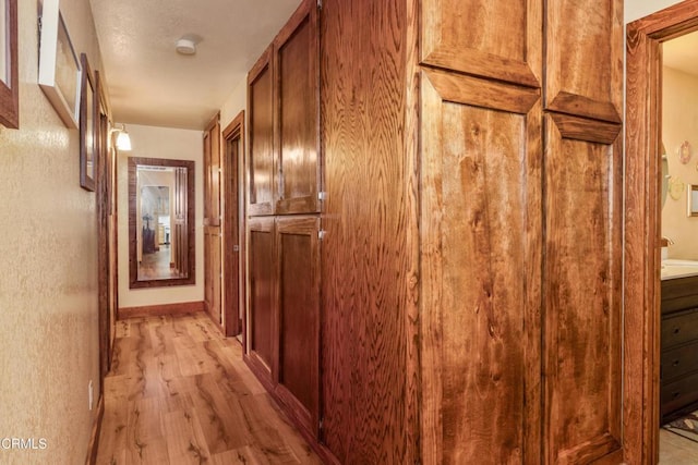 51793 Quail Ridge Rd, Oakhurst, CA 93644 - hall with light wood-style flooring
