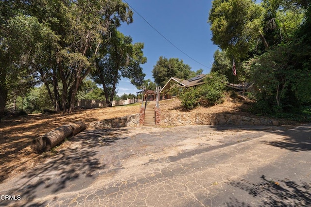 51793 Quail Ridge Rd, Oakhurst, CA 93644 - view of yard featuring stairway