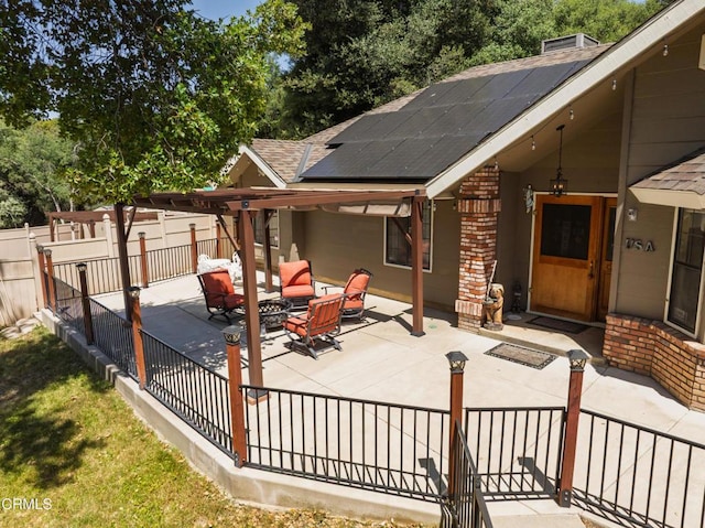51793 Quail Ridge Rd, Oakhurst, CA 93644 - fenced backyard featuring a patio area and an outdoor fire pit