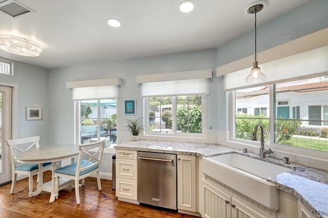 3372 Corsica Way, Oceanside, CA 92056 - kitchen with stainless steel dishwasher, wood-type flooring, healthy amount of natural light, decorative light fixtures, and recessed lighting