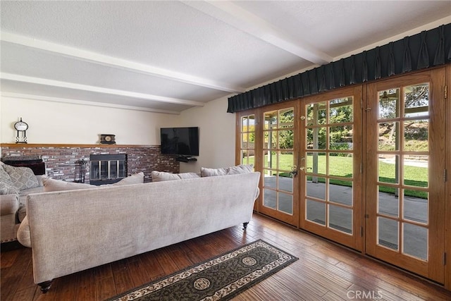 469 Grinnel Ct, Simi Valley, CA 93065 - living room featuring beamed ceiling, wood-type flooring, and a brick fireplace